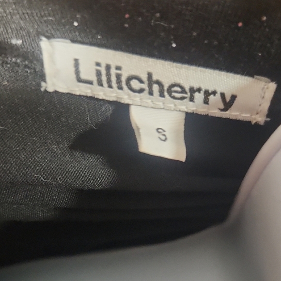 Elegant Black Glitter Ruffle Sleeve Women's Blouse - Picture 2 of 7